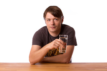 Image showing Man with a glass of water
