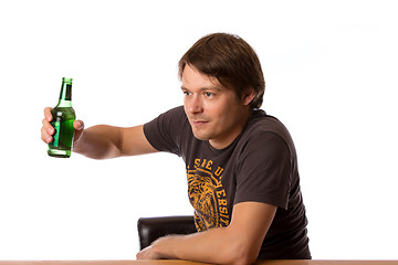 Image showing Man with a bottle of beer