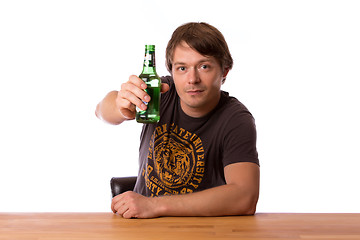 Image showing Man with a bottle of beer