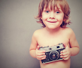 Image showing boy with an old camera