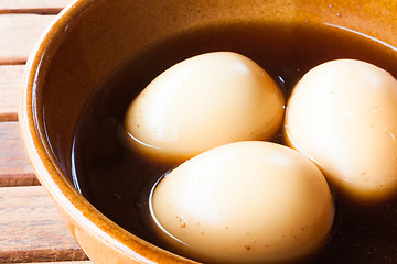 Image showing Hard-boiled eggs stew with sweet gravy