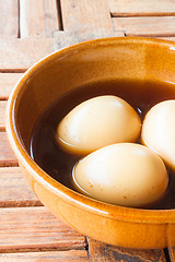 Image showing Hard-boiled eggs stew with sweet gravy