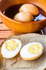 Image showing Hard-boiled eggs stew with sweet gravy