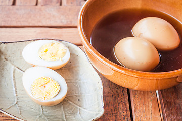 Image showing Hard-boiled eggs stew with sweet gravy