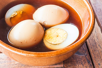 Image showing Hard-boiled eggs stew with sweet gravy