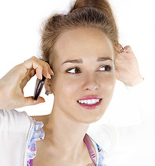 Image showing face of woman with cell phone