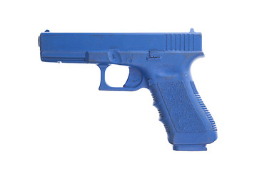 Image showing Dirty blue training gun isolated on white