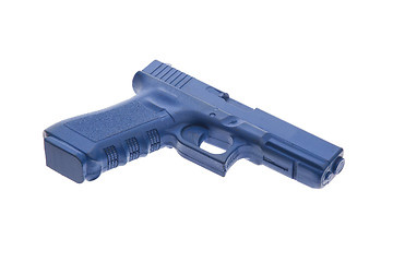 Image showing Dirty blue training gun isolated on white