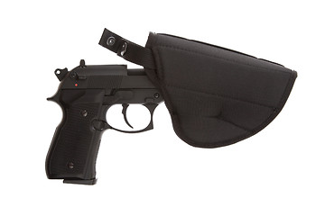 Image showing 9mm Pistol in a flexible holster