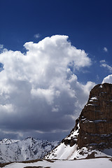 Image showing Snowy rocks in clouds