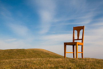 Image showing The old chair on the golf course