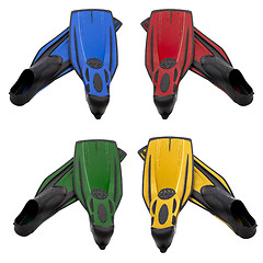 Image showing Set of multicolored flippers for diving with water drops