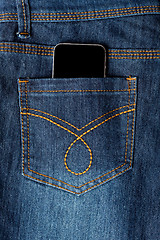 Image showing Cellphone in jeans pocket