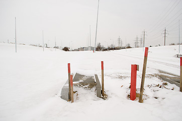 Image showing road sidewalk construction works snow winter 