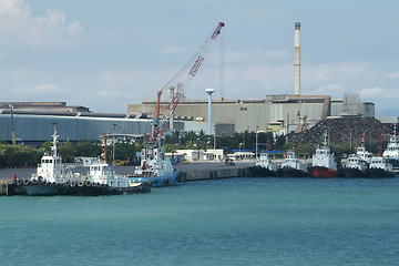 Image showing Tugboats at an industrial harbour