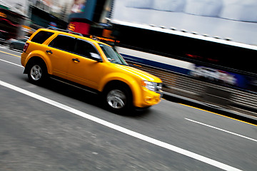 Image showing Speeding NYC Taxi SUV