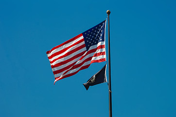 Image showing American flag with a POW-MIA flag below it.