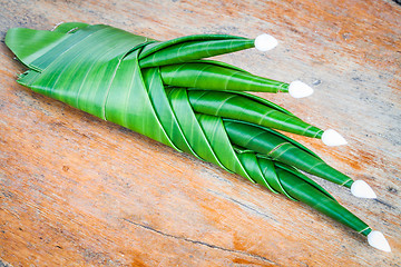 Image showing Handmade banana leaf rice offering prepare for worship