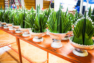 Image showing Lot of banana leaf rice offerings in metal tray