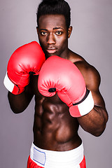 Image showing Muscular male boxer with serious look on face