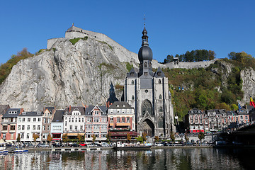 Image showing The center of the town of Dinant with the citadelle on the rock and Collegiate Church of Notre-Dame at the Meuse river