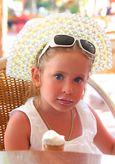 Image showing cute little girl with ice-cream