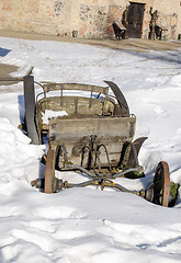 Image showing vintage grunge wooden carriage remains snow winter 