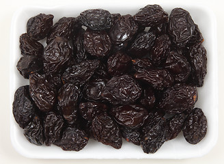 Image showing Tray of prunes from above