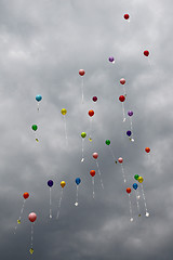 Image showing color ballons on the grey sky 