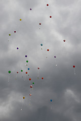 Image showing color ballons on the grey sky 