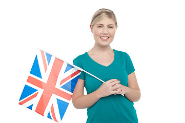 Image showing Young UK supporter holding national flag