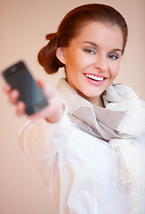 Image showing Brunette woman with mobile phone