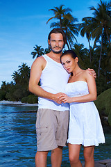 Image showing Couple next to Palm tree