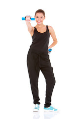 Image showing Fitness woman working out with free weights