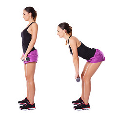 Image showing Woman working out with barbells