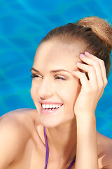 Image showing Close up of adorable woman in swimming pool