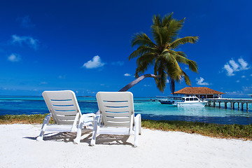 Image showing Sunbeds at the beach