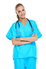 Image showing Young doctor holding her stethoscope around her neck