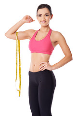 Image showing Slim woman with a tape measure