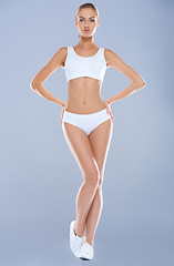 Image showing Attractive young woman with perfect body in white underwear