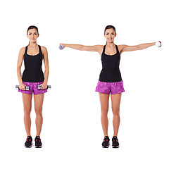 Image showing Young woman working out with dumbbells