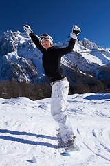 Image showing Female Snowboarder in Dolomites