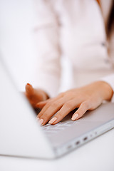 Image showing Business woman typing on laptop keyboard
