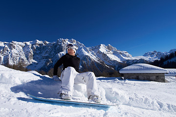 Image showing Female Snowboarder in Dolomites