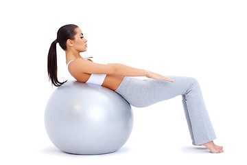 Image showing Doing abdominal muscles with fitness ball