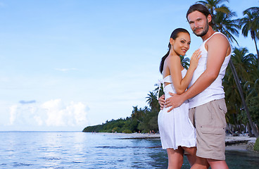 Image showing Couple nex to Palm tree