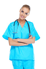 Image showing Smiling beautiful doctor in scrubs