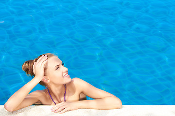 Image showing Cute in swimming pool with copy space