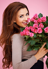 Image showing Laughing romantic woman with roses