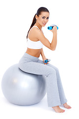 Image showing Sweet brunette doing fitness exercises